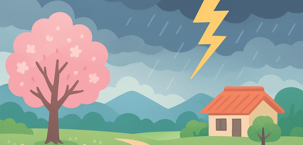 Sudden thunderstorm in spring with dark clouds and lightning over Japanese countryside, mountains in