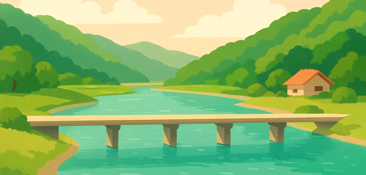 A serene view of the Shimanto River in Kochi with a low submerged bridge crossing clear turquoise wa