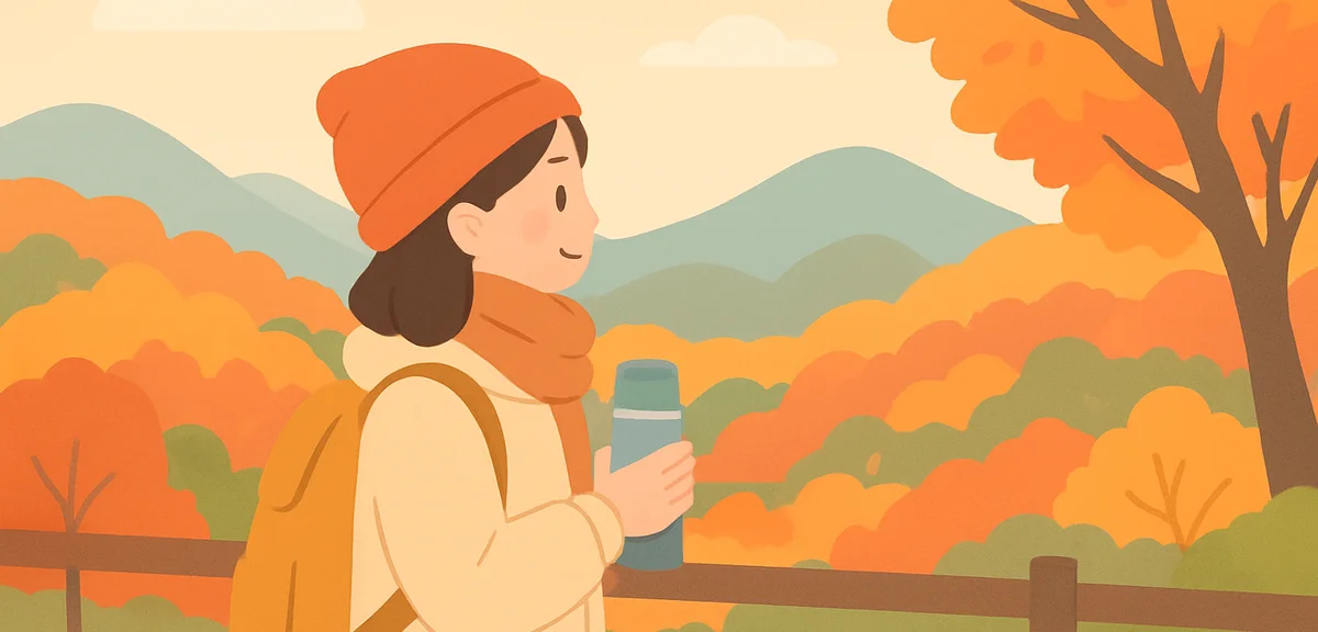 Cozy autumn travel scene, a person in warm layered clothing holding a thermos looking at colorful mo